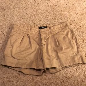 Tan shorts with front and back pockets